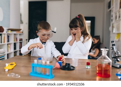 brother and sister do chemical experiments at home - Powered by Shutterstock