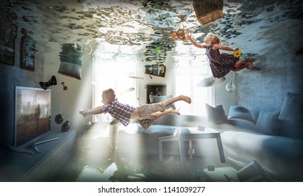 Brother And Sister Play In Flooded Room