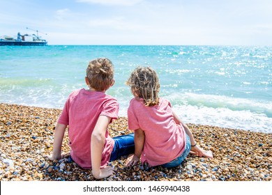 Brother and sister at sea coast, Brighton