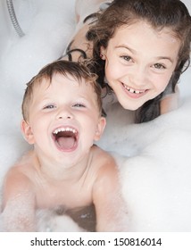 Brother And Sister Taking A Bubble Bath 