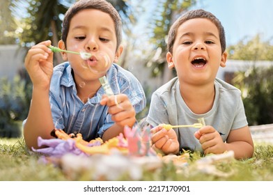 Brothers Kids Blowing Bubbles In Park, Garden And Backyard, Grass And Nature Fun, Joy And Happy Youth Development, Growth And Relax. Young Brothers, Happy Children Playing Game And Soap Bubbles