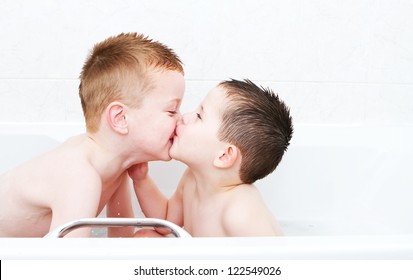 brothers playing in the bath tub