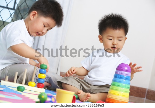 Brothers Playing Together Sharing Toys Home Stock Photo 35515963 ...