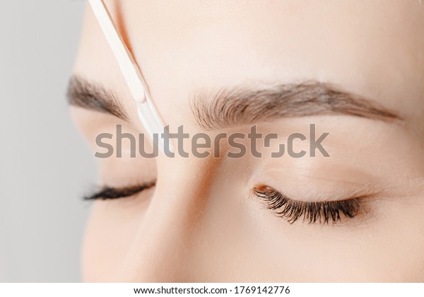 Brow correction master wax depilation of eyebrow\
hair in women.
