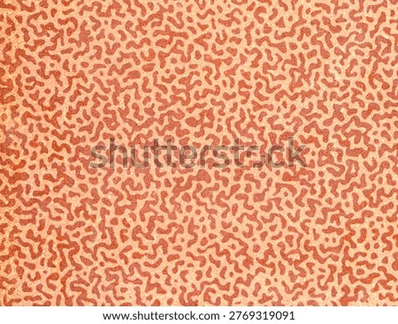 Brown, aged surface with chaotic, abstract pattern. A light-brown background with swirls and squiggles in a curved shape, reminiscent of microbes. Faded, patterned texture on heavyweight brown paper