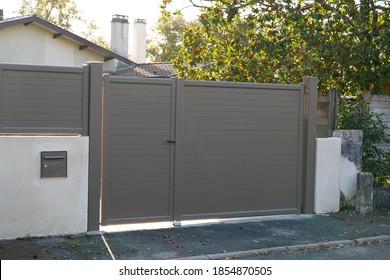 brown aluminum modern style gate home portal of suburb city house