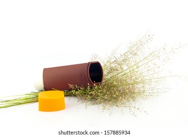 Brown Asthma Inhaler And Flower Of Grass