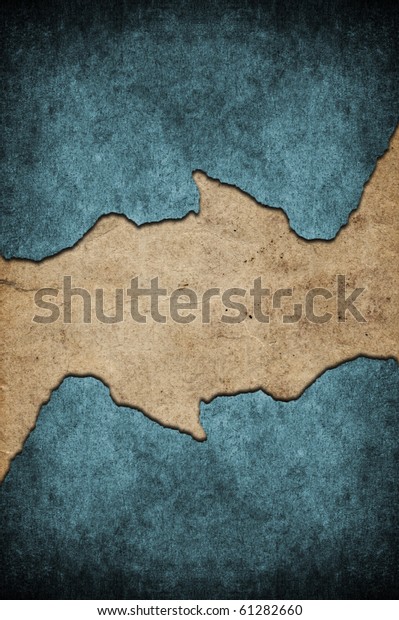 A brown\
background with a blue card\
ripped