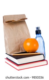 A Brown Bag School Lunch, With Fruit And Water