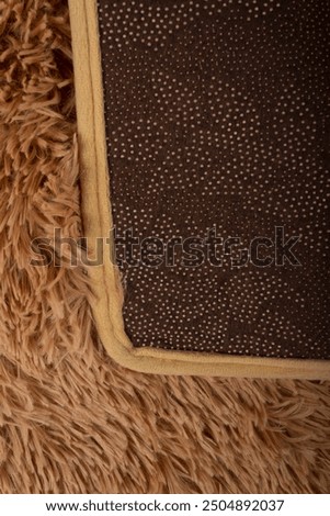 brown bathmat with wrong and right sides