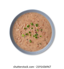 Brown Bean Soup In A Bowl Isolated Over White Background.