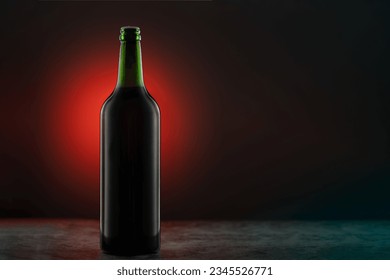 A brown beer bottle is illuminated in a dark setting with a red light, creating an eye-catching contrast