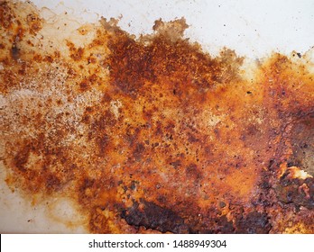 Brown, black and yellow rust on white enamel. Rusted brown and white abstract texture. Corroded white metal background. Rusted white painted metal wall. Rusty metal surface with streaks of rust.  - Shutterstock ID 1488949304