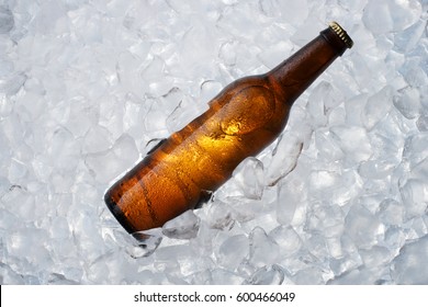 A Brown Bottle On Ice