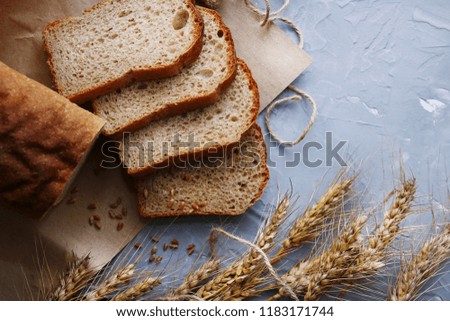 brown bread on light background top view on craft paper