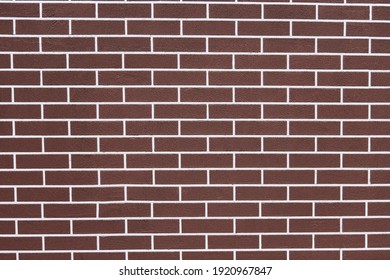 Brown Brick Wall With White Grout Lines Pattern. Abstract Brick Texture Background. New House Exterior. Loft Design.