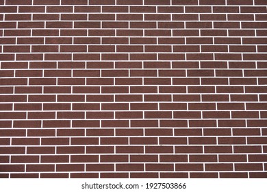 Brown Brick Wall With White Grout Lines Pattern. Abstract Brick Texture Background. New House Exterior. Loft Design.