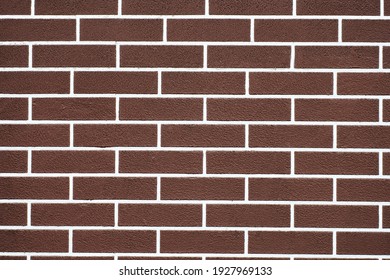 Brown Brick Wall With White Grout Lines Pattern. Abstract Brick Texture Background. New House Exterior. Loft Design.