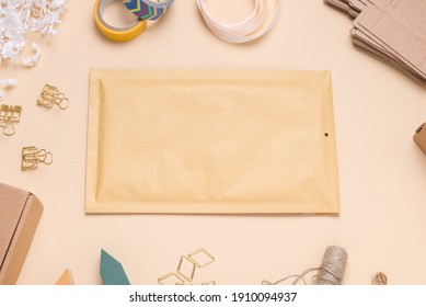 Brown Bubble Envelope On Color Desk