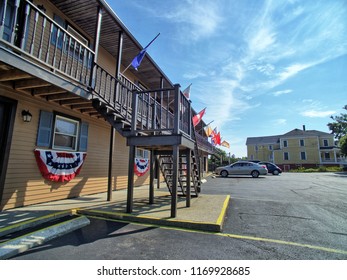 Brown building with flags