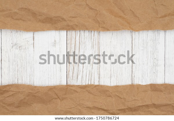 Brown butcher paper\
banner on weathered whitewash wood background with copy space for\
your shipping message