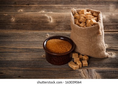 Brown Cane Sugar Cubes In Burlap Sack