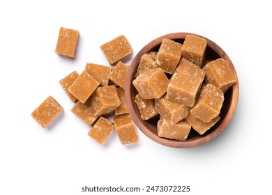 Brown cane sugar cubes in wooden bowl  isolated on white background, top view, flat lay. - Powered by Shutterstock