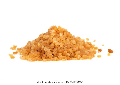 Brown cane sugar pieces isolated on white background - Shutterstock ID 1575802054