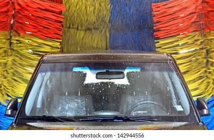 Brown Car Inside Carwash