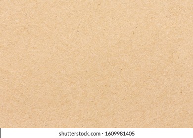 Brown cardboard sheet of paper background - Shutterstock ID 1609981405