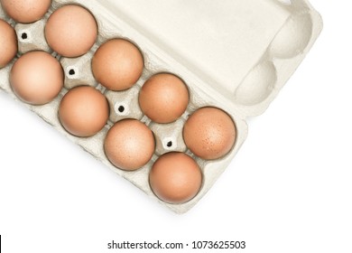 Brown Chicken Eggs In A Grey Carton Box Top View Isolated On White Background Set Of Ten
