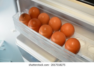 Brown Chicken Eggs Neatly Arranged In The Refrigerator Egg Tray.