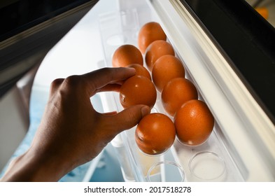 Brown Chicken Eggs Neatly Arranged In The Refrigerator Egg Tray.