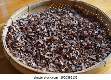 Brown Cocoa Husk Dry In A Basket                              