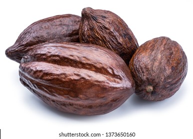 Brown cocoa pods isolated on a white background.
