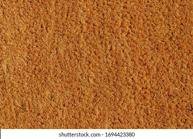Brown coir natural fiber doormat, Close up details texture of coconut doormat, Plain natural dried mat and trap dirt outside your entrance, Abstract background.