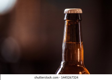 Brown Cold Beer Bottle With Water Drops