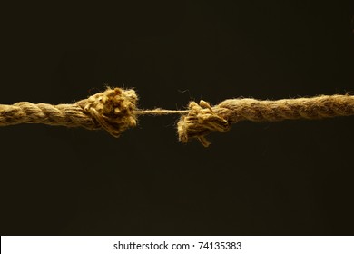 Brown cord on a black background