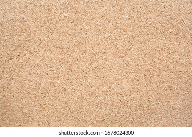 
Brown cork board texture, top view. Natural material, natural background.