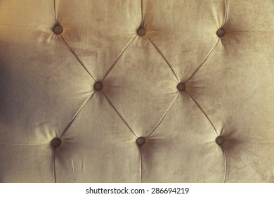 Brown Couch Background Texture With Sunken Buttons.