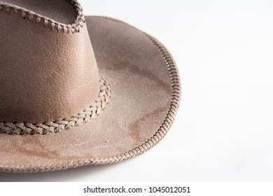 Brown cowboy hat use in farm