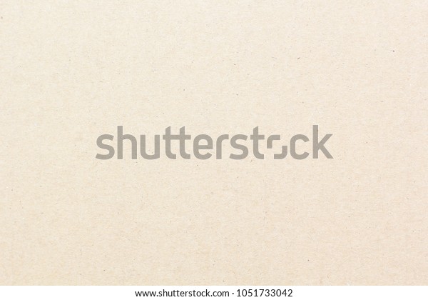 Brown craft cardboard paper sheet of recycle\
paper background and\
texture.