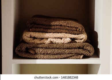 brown and cream towels