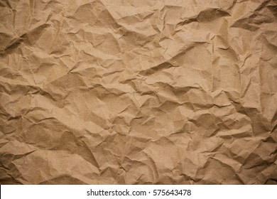 Brown crumpled wrapping paper as background