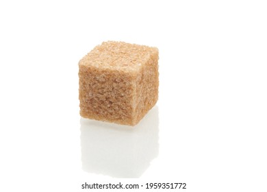 Brown Cube Of Cane Sugar Isolated On White Background. Close Up View.