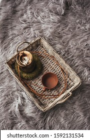 Brown Cup On Board. Cozy Place Near Window. Grey Furry Rug