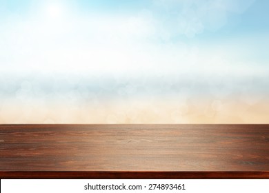 Brown Desk Space And Sea With Sky 