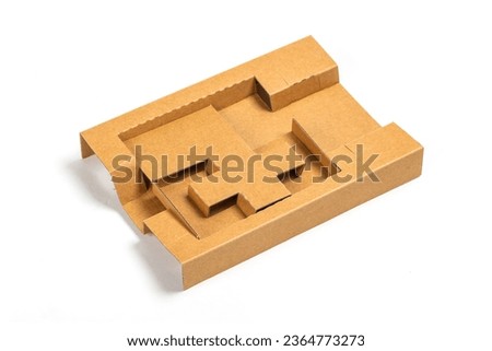 Brown die cut corrugated container box isolated on white background, Double protection packaging for industrial product