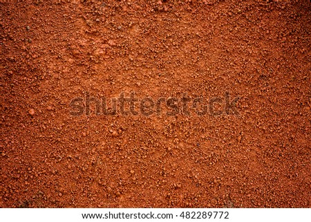 Brown dirt (soil) as background.