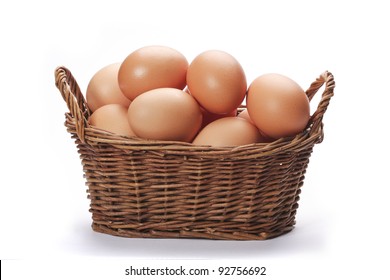 Brown Eggs In The Basket On White